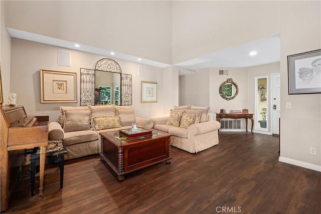 9 Northgrove Unit 11, Irvine, CA 92604 - living area featuring dark wood-style flooring, recessed lighting, baseboards, and a high ceiling