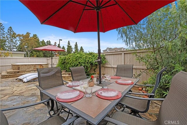 9 Northgrove Unit 11, Irvine, CA 92604 - view of patio with outdoor dining area and a fenced backyard