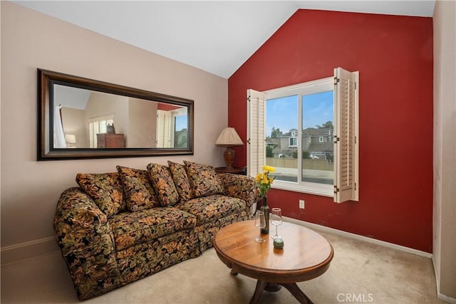 9 Northgrove Unit 11, Irvine, CA 92604 - carpeted living room with lofted ceiling and baseboards