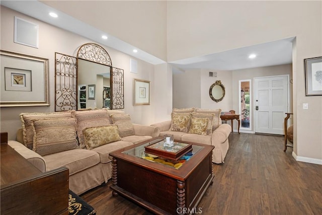9 Northgrove Unit 11, Irvine, CA 92604 - living room featuring dark wood-style floors, recessed lighting, baseboards, and a towering ceiling