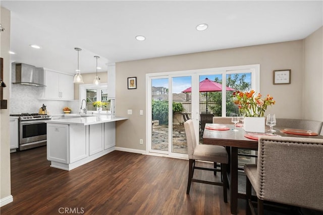 9 Northgrove Unit 11, Irvine, CA 92604 - dining space featuring dark wood-type flooring, recessed lighting, and baseboards