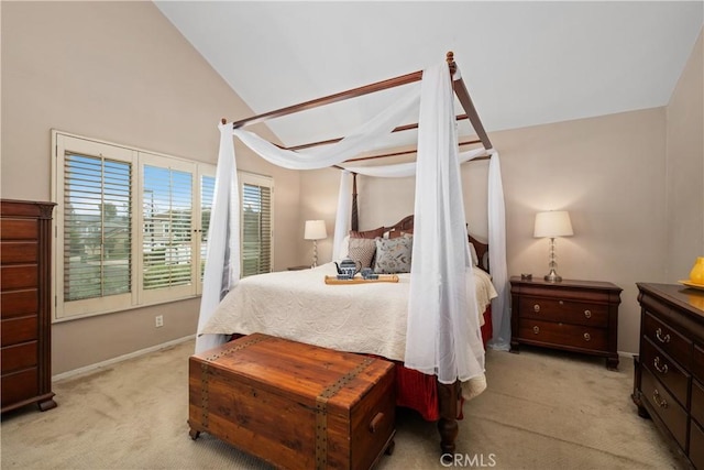 9 Northgrove Unit 11, Irvine, CA 92604 - bedroom featuring light carpet, baseboards, and lofted ceiling