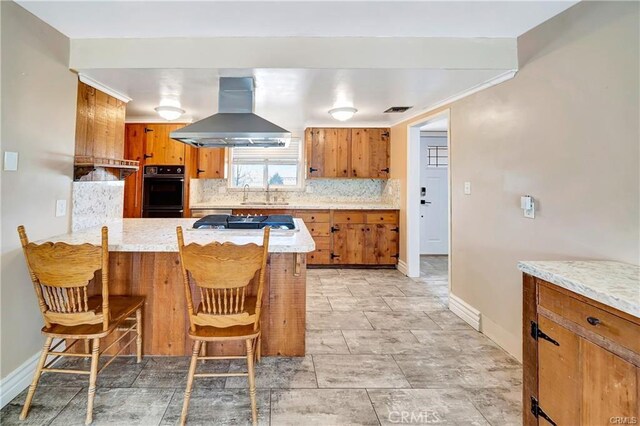 5306 W W Ave M4, Lancaster, CA 93536 - kitchen with extractor fan, brown cabinets, decorative backsplash, and stainless steel gas stovetop