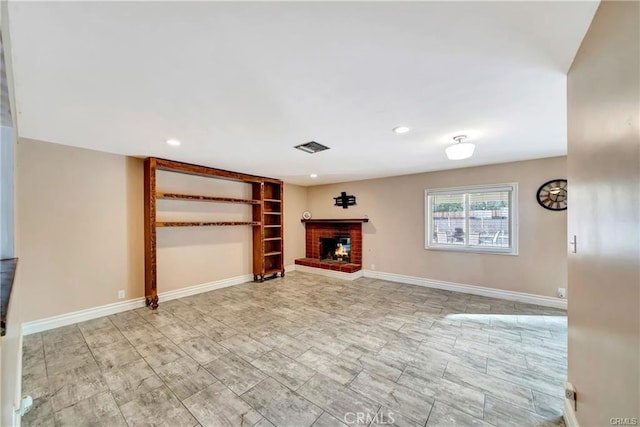5306 W W Ave M4, Lancaster, CA 93536 - unfurnished living room featuring a fireplace and recessed lighting