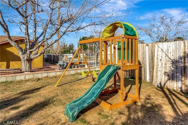 5306 W W Ave M4, Lancaster, CA 93536 - view of play area with a fenced backyard