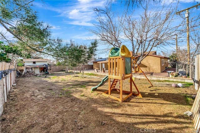 5306 W W Ave M4, Lancaster, CA 93536 - view of play area with a fenced backyard
