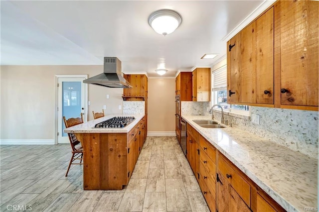 5306 W W Ave M4, Lancaster, CA 93536 - kitchen with extractor fan, a sink, stainless steel gas cooktop, brown cabinets, and tasteful backsplash