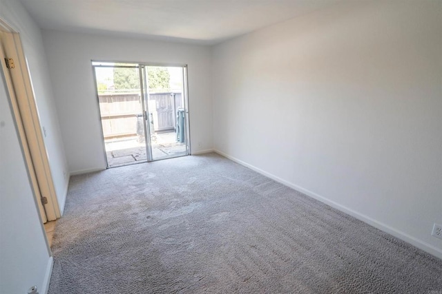 6860 Panamint Row Unit 2, San Diego, CA 92139 - empty room with light carpet and baseboards