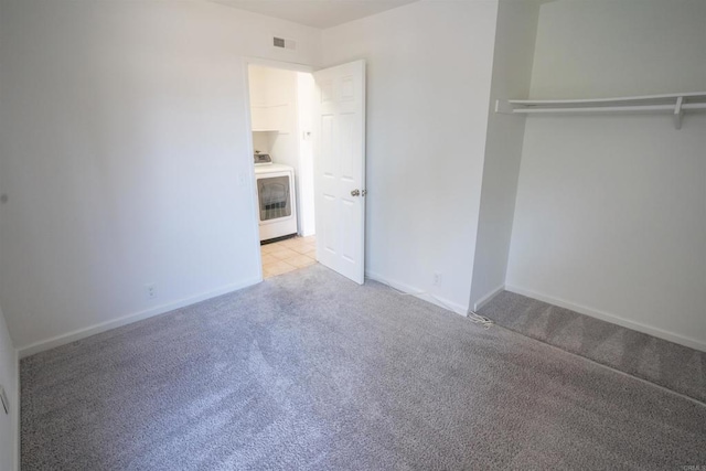 6860 Panamint Row Unit 2, San Diego, CA 92139 - unfurnished bedroom featuring washer / dryer, light colored carpet, and baseboards