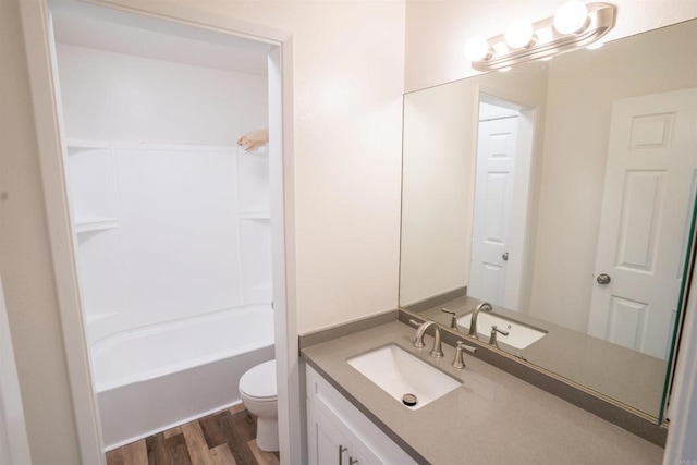 6860 Panamint Row Unit 2, San Diego, CA 92139 - bathroom with toilet, vanity, wood finished floors, and shower / tub combination