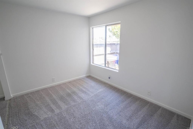 6860 Panamint Row Unit 2, San Diego, CA 92139 - empty room with carpet floors and baseboards