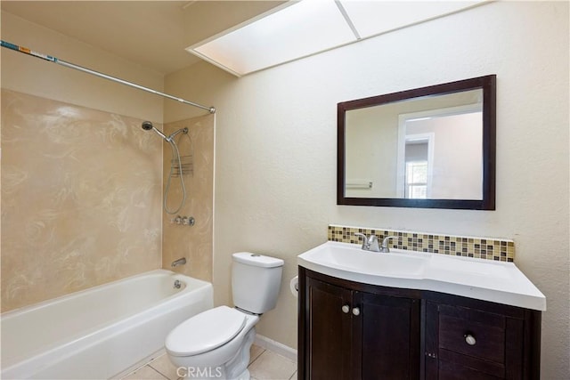 14889 Hartford Ln, Helendale, CA 92342 - full bathroom with decorative backsplash, vanity, toilet, shower / bathtub combination, and tile patterned flooring