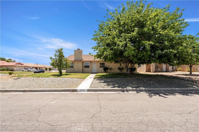 14889 Hartford Ln, Helendale, CA 92342 - obstructed view of property with a chimney