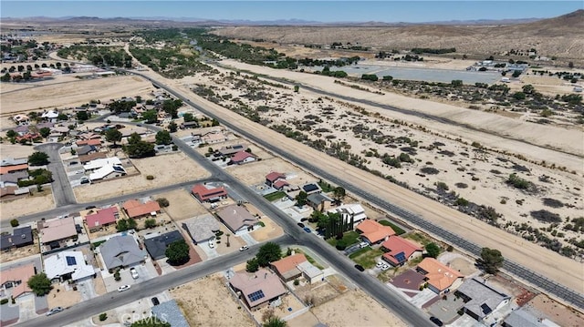 14889 Hartford Ln, Helendale, CA 92342 - aerial view of residential area with a mountain backdrop and a desert landscape