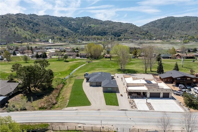 aerial view of residential area with a mountainous background