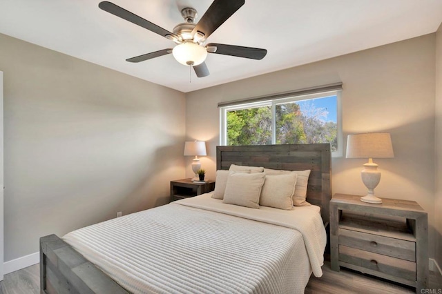 1055 Via Lomita, Escondido, CA 92027 - bedroom with wood finished floors, baseboards, and a ceiling fan
