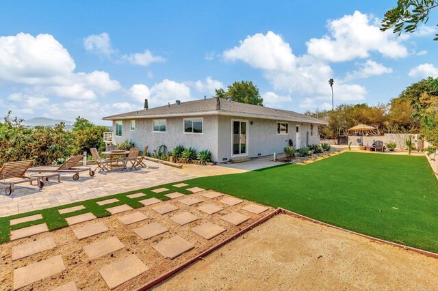 1055 Via Lomita, Escondido, CA 92027 - rear view of house featuring a patio, stucco siding, and a yard