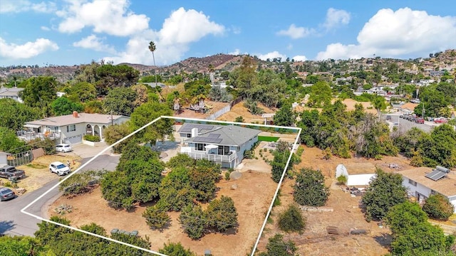 1055 Via Lomita, Escondido, CA 92027 - view from above of property with property boundaries highlighted and a mountainous background