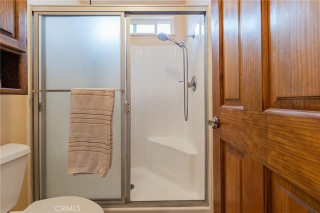 2219 S Elderberry Ave, Ontario, CA 91762 - bathroom featuring a shower stall and toilet