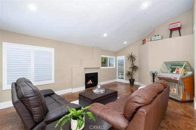 620 Via Umbroso, San Clemente, CA 92672 - living room featuring recessed lighting, baseboards, a warm lit fireplace, and vaulted ceiling