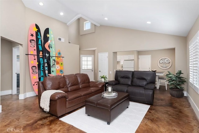 620 Via Umbroso, San Clemente, CA 92672 - living area with finished concrete flooring, baseboards, high vaulted ceiling, healthy amount of natural light, and recessed lighting