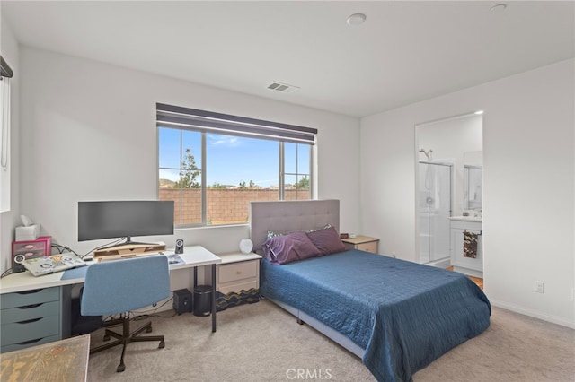 27083 Comrade Cir, Menifee, CA 92585 - bedroom featuring light colored carpet, a desk, connected bathroom, and baseboards
