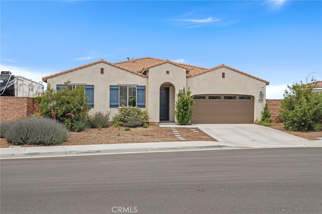 27083 Comrade Cir, Menifee, CA 92585 - mediterranean / spanish home featuring stucco siding, a garage, a tile roof, and driveway