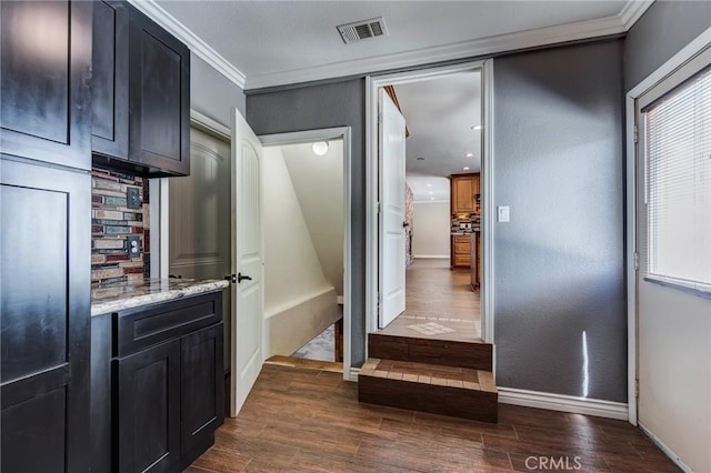 37095 Oak View Rd, Yucaipa, CA 92399 - corridor featuring dark wood-style flooring, baseboards, and ornamental molding