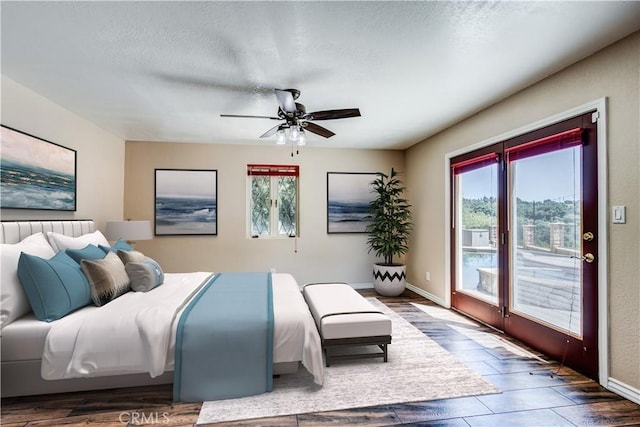 37095 Oak View Rd, Yucaipa, CA 92399 - bedroom featuring multiple windows, access to exterior, baseboards, a ceiling fan, and a textured ceiling