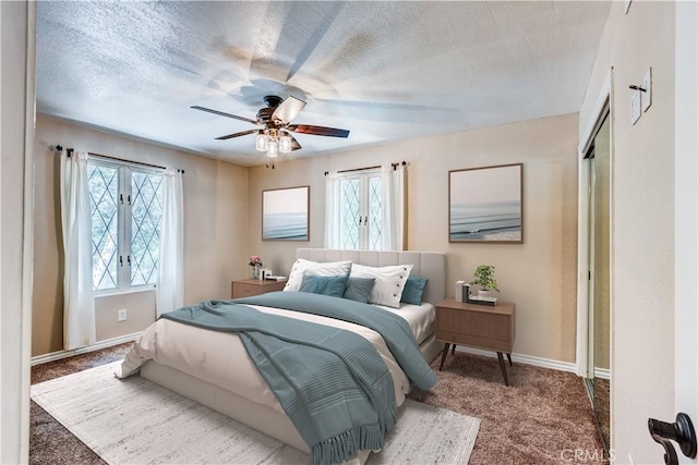 37095 Oak View Rd, Yucaipa, CA 92399 - carpeted bedroom with multiple windows, baseboards, and ceiling fan