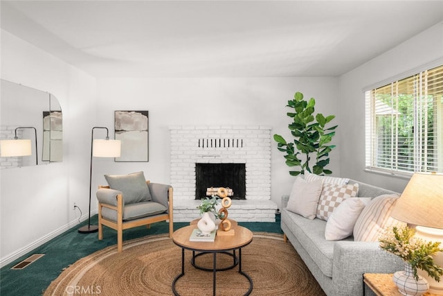5375 Nord Hwy, Chico, CA 95973 - carpeted living area featuring baseboards and a brick fireplace
