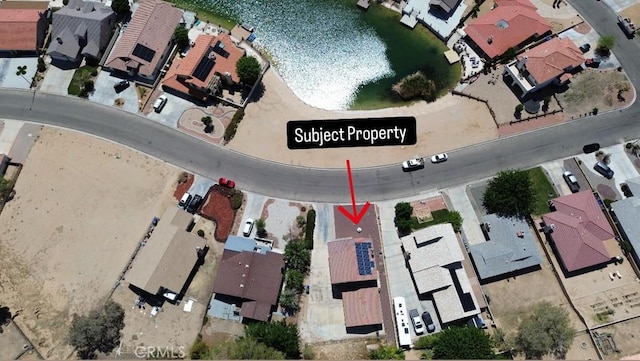 aerial view of property's location featuring nearby suburban area
