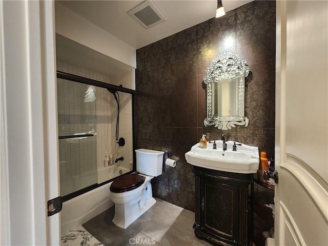 1428 Blenbury Dr, Diamond Bar, CA 91765 - full bath featuring toilet, combined bath / shower with glass door, vanity, tile patterned flooring, and wallpapered walls