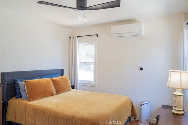 895 W 23rd St, Upland, CA 91784 - bedroom with a wall unit AC, a ceiling fan, and baseboards