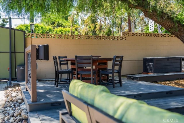 895 W 23rd St, Upland, CA 91784 - view of patio / terrace featuring a wooden deck, fence, and outdoor dining space