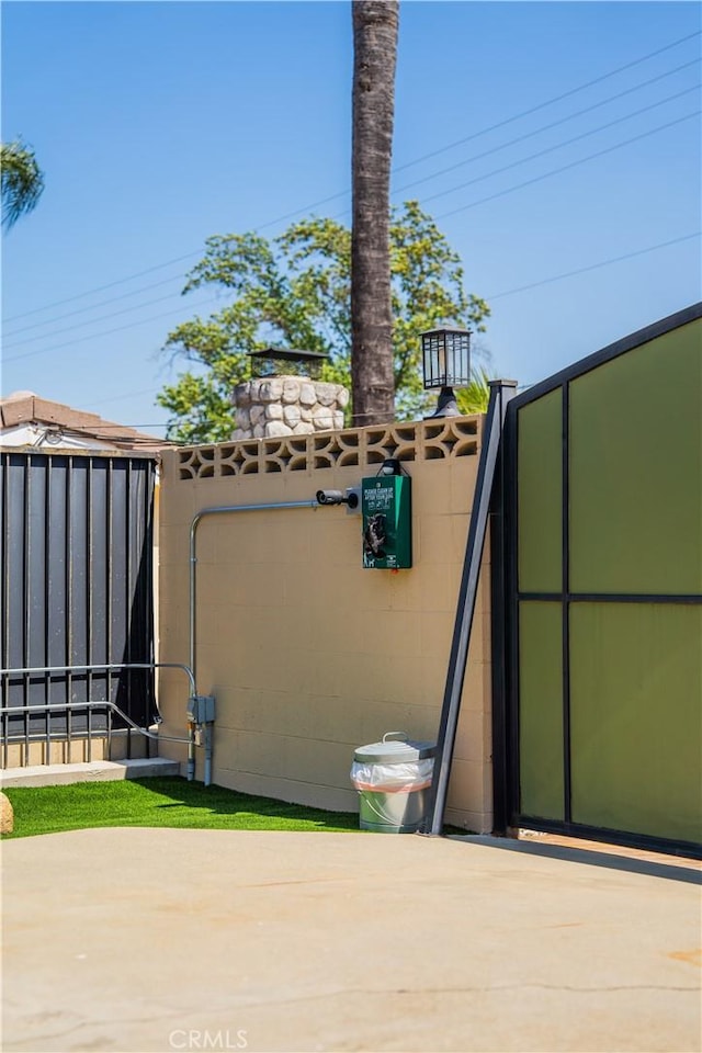 895 W 23rd St, Upland, CA 91784 - view of patio with a gate and fence