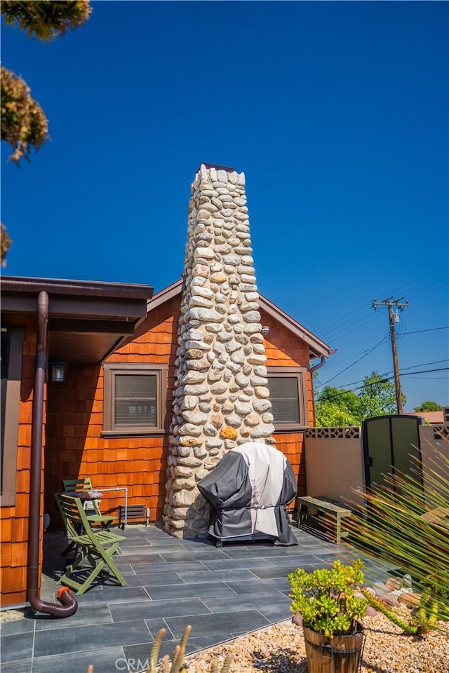 895 W 23rd St, Upland, CA 91784 - view of patio / terrace with grilling area and fence