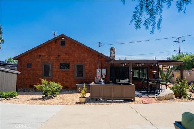 895 W 23rd St, Upland, CA 91784 - rear view of house with a chimney, a patio, fence, and crawl space