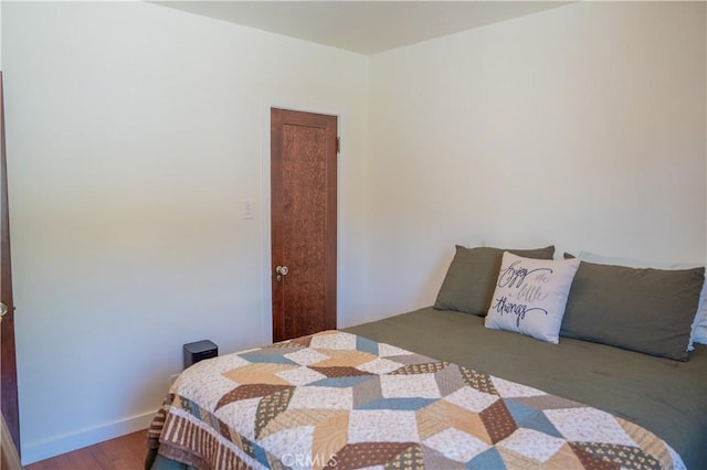 895 W 23rd St, Upland, CA 91784 - bedroom featuring wood finished floors
