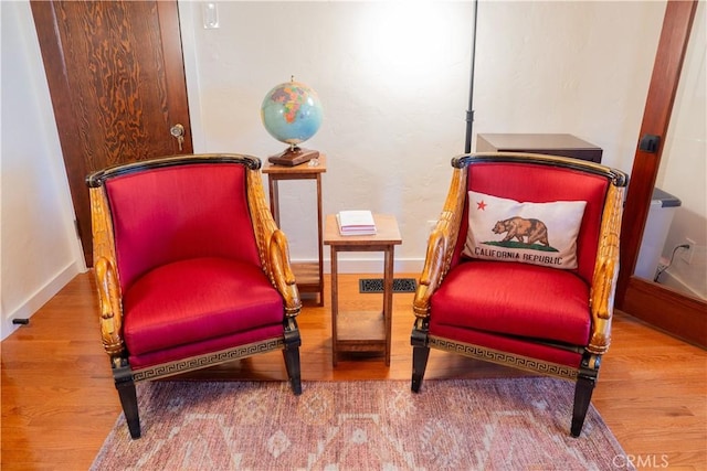 895 W 23rd St, Upland, CA 91784 - sitting room with wood finished floors and baseboards