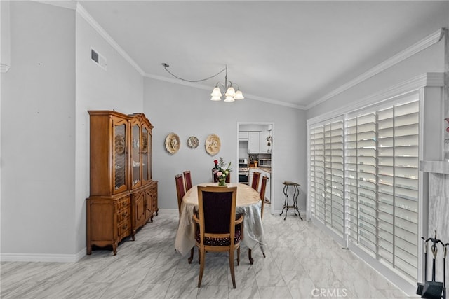 dining space featuring a chandelier, ornamental molding, vaulted ceiling, light marble finish flooring, and baseboards