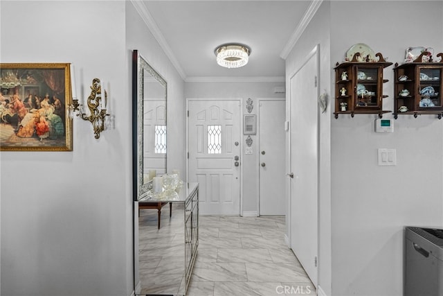corridor featuring crown molding, light marble finish flooring, baseboards, and a chandelier