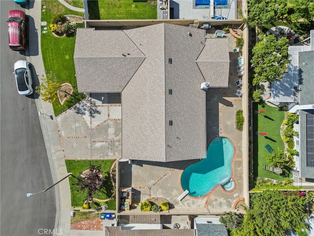 drone / aerial view of a pool