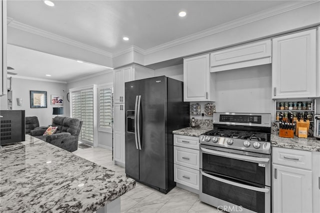 kitchen with range with two ovens, refrigerator with ice dispenser, white cabinets, recessed lighting, and crown molding