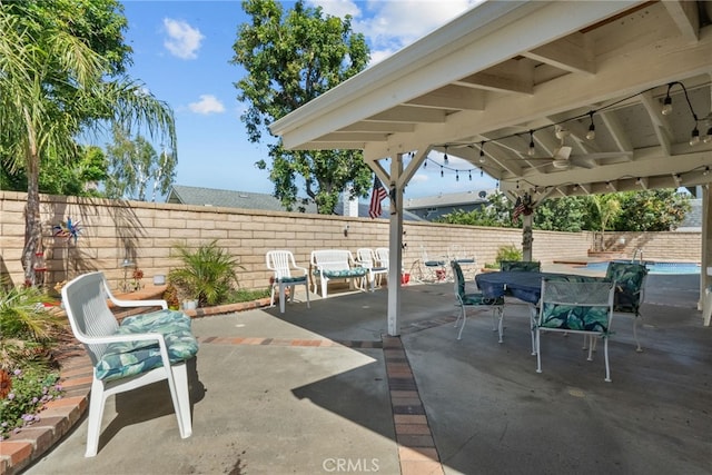 25536 Old Course Way, Valencia, CA 91355 - fenced backyard featuring ceiling fan, outdoor dining space, and a patio