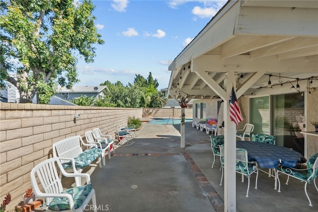 25536 Old Course Way, Valencia, CA 91355 - fenced backyard featuring a patio area and outdoor dining space