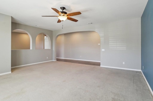 31332 Bluebeech Ct, Temecula, CA 92592 - carpeted empty room with a ceiling fan and arched walkways