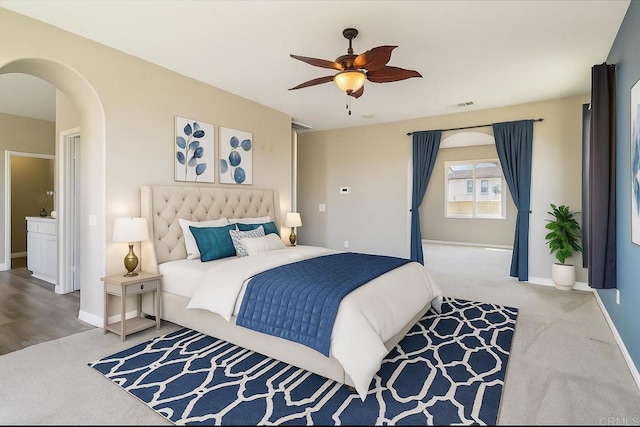 31332 Bluebeech Ct, Temecula, CA 92592 - bedroom featuring arched walkways, carpet, and ceiling fan