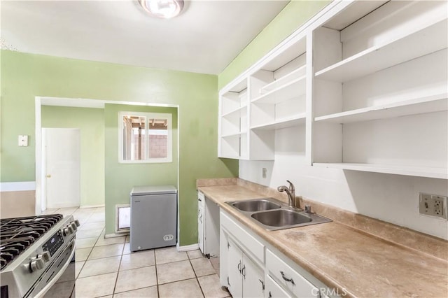 68269 Via Domingo, Desert Hot Springs, CA 92240 - kitchen with open shelves, a sink, refrigerator, and gas range