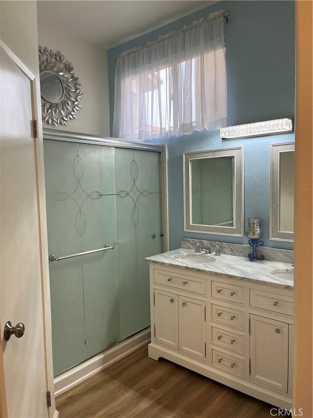 1321 Cypress Point Dr, Banning, CA 92220 - full bath with wood finished floors and double vanity